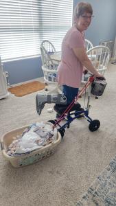  using a Orthomate All Terrain Knee Scooter from  Ormond Beach Florida May 2024